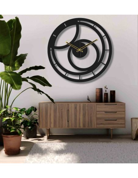 Large metal wall clock shown in a contemporary office interior