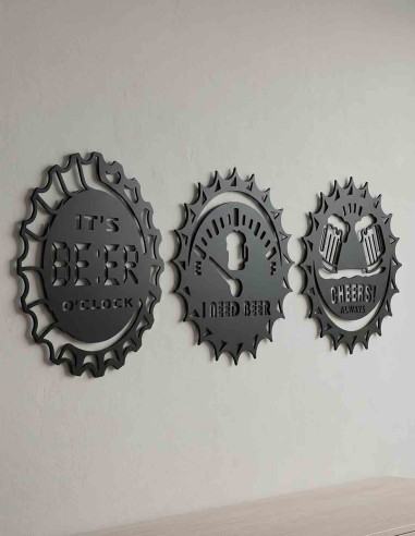 Three metal bottle cap wall hangings arranged as a row above a bar cart