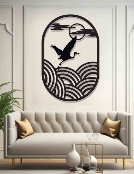 Rising sun and crane metal wall art detail with stylised ocean waves Rising sun and crane metal wall art detail with stylised ocean waves