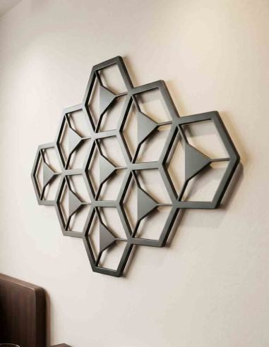Close view of the hexagonal honeycomb grid on the large matte black metal wall art